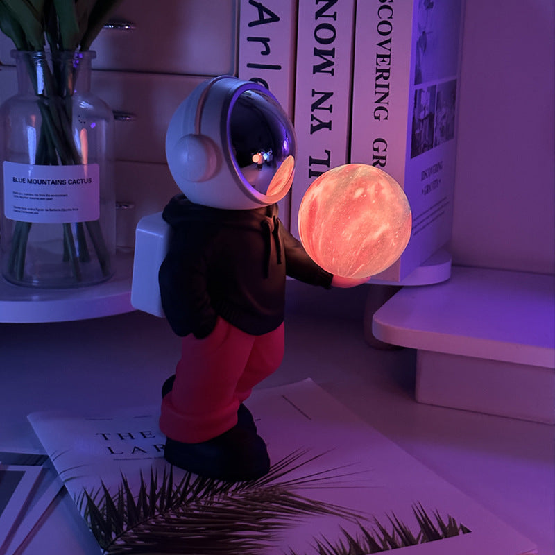 NNEDSZ Holding the dreamy starry sky (black top + red pants) Creative Astronaut Bluetooth Speaker with 3D Starry Sky Lighting, Portable Wireless Moon Lamp Speaker - Perfect Gift for Space Enthusiasts