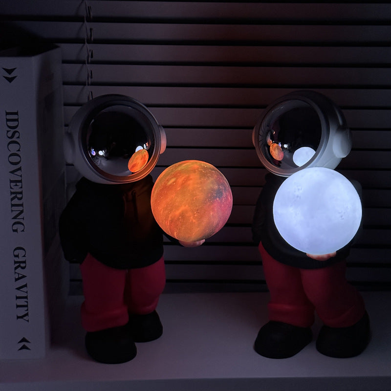 NNEDSZ Holding the dreamy starry sky (black top + red pants) Creative Astronaut Bluetooth Speaker with 3D Starry Sky Lighting, Portable Wireless Moon Lamp Speaker - Perfect Gift for Space Enthusiasts